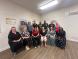 A group of people in a meeting room
