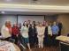 Attendees from the Canberra workshop join our expert Mr Trevor Sutton (far right) to talk about opportunities on NDIS pricing reform.