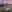 Brisbane city skyline with the river and a ferry in the foreground
